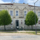 Čištění fasády základní a mateřské školy Městys Štítary pomocí přípravku ISOKOR Facade Professional - Fasáda školy před čištěním